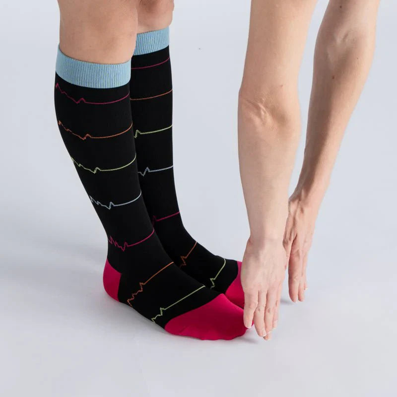 Unisex gentle compression socks in midnight pink, ideal footwear for travel and daily health