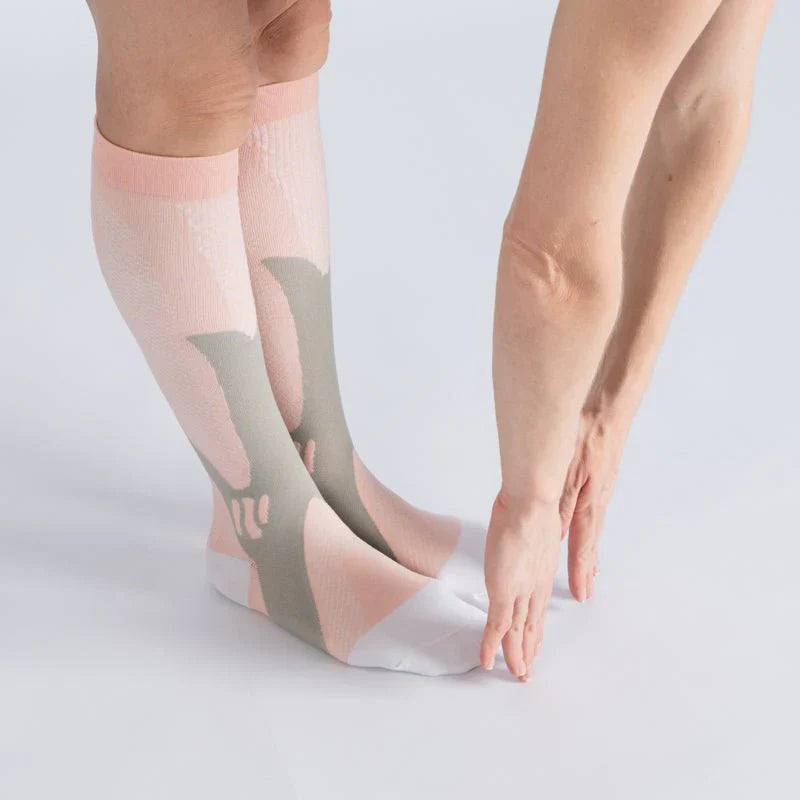 Close-up of royal pink gentle compression socks, designed for comfort and circulation support.