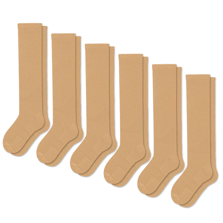 Unisex tan compression socks, designed for gentle support, promoting circulation and all-day comfort.