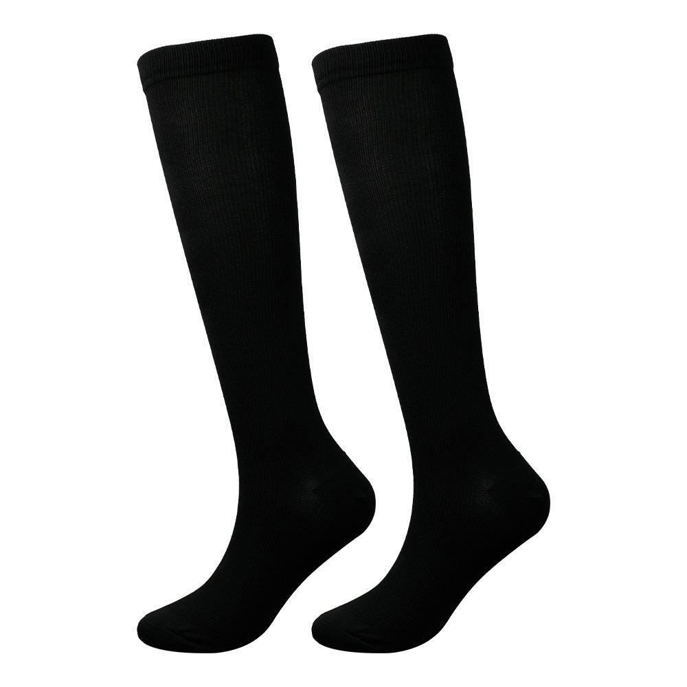 Pair of unisex gentle compression socks for everyday wear, light grey, providing comfortable leg and foot support.