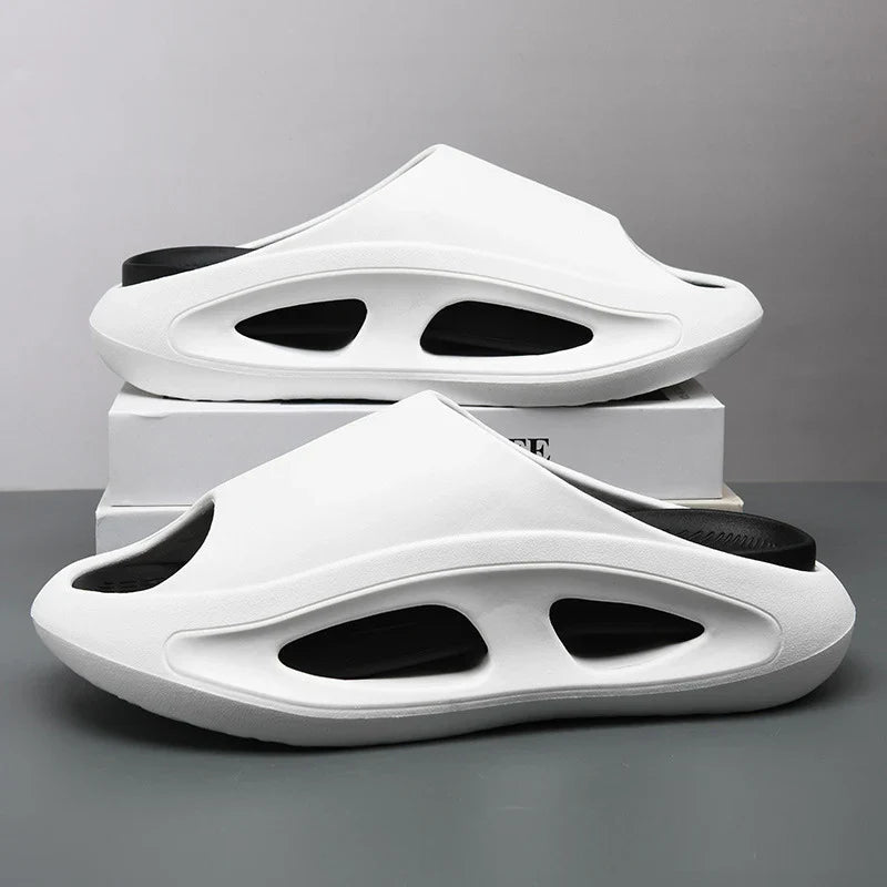 Unisex EVA cloud slides on a light background, showcasing their cushioned feel as casual house shoes.