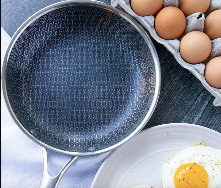 Effortlessly sear with this durable stainless steel skillet. Induction-ready non-stick frying pan for kitchen.