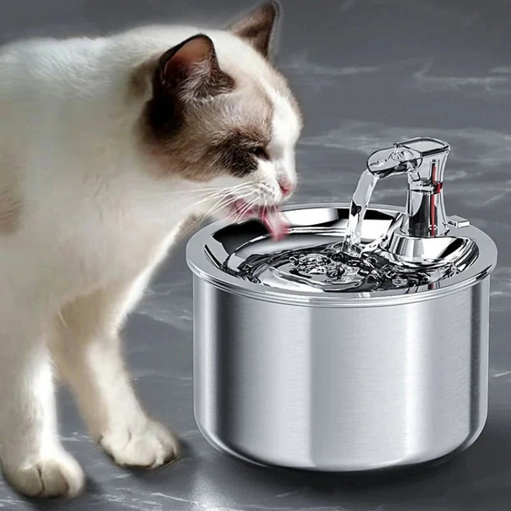 Pet's Smart Stainless Steel Water Fountain with filter & motion sensor for cats & dogs. Promotes hydration.