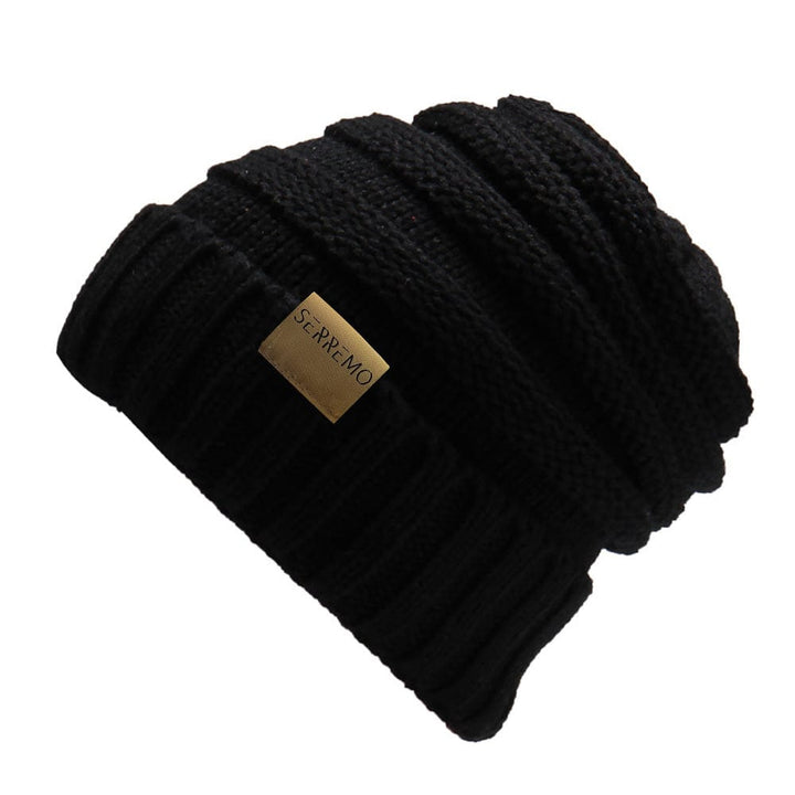 Black knit winter beanie hat, essential women's cold weather accessory, acrylic knitwear