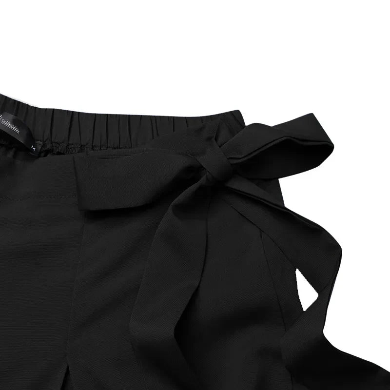 Elegant women's plus-size wide-leg pants, high-waisted for a sophisticated professional look.