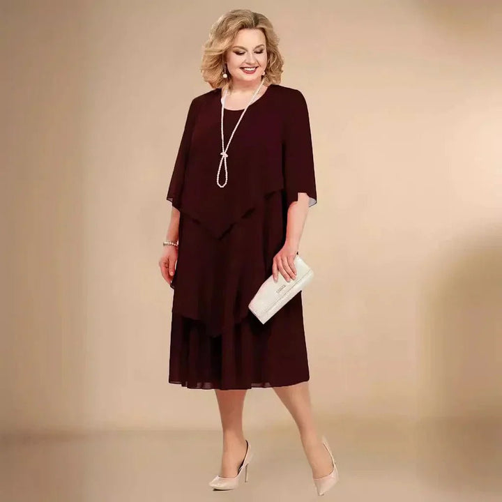 Elegant plus size party dress for women, layered asymmetrical chiffon, ideal for special occasions & wedding guests.