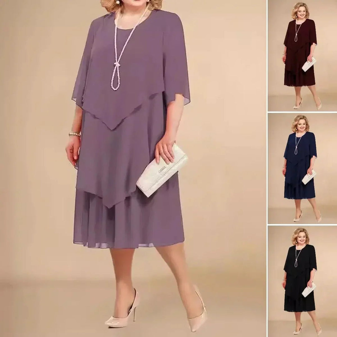 Chic plus size elegant layered asymmetrical chiffon dress for women, knee-length, perfect for formal events.
