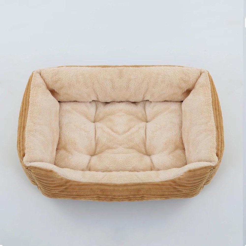 Plush pet bed for small to large dogs. Super soft, washable dog bed provides cozy, secure rest.