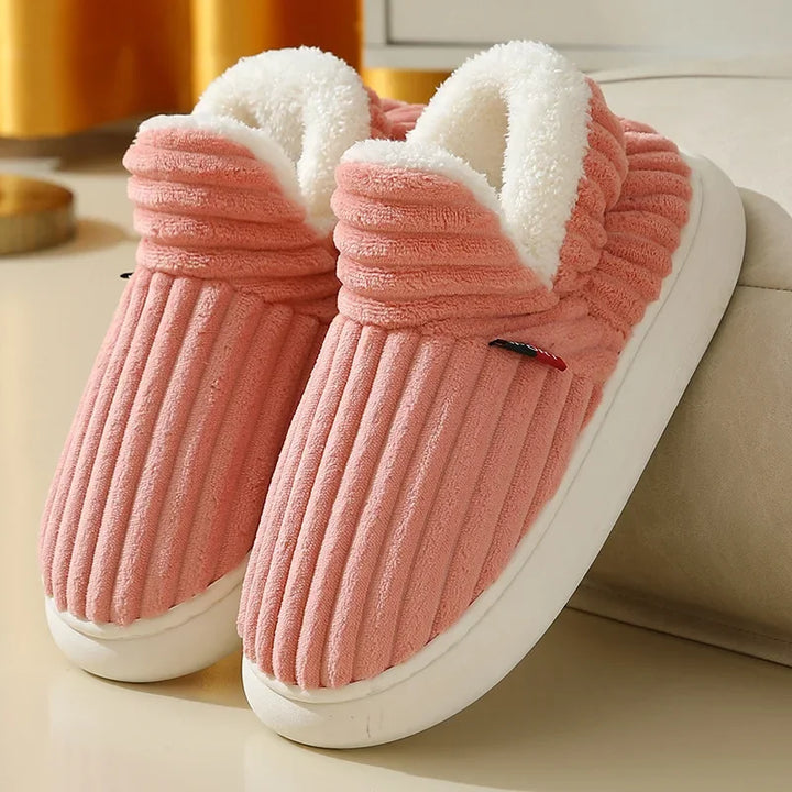 Pair of unisex indoor slippers, showcasing soft corduroy and comfortable design
