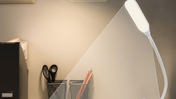 Portable black reading lamp with adjustable clamp, three color modes, and long battery life for custom lighting solutions.