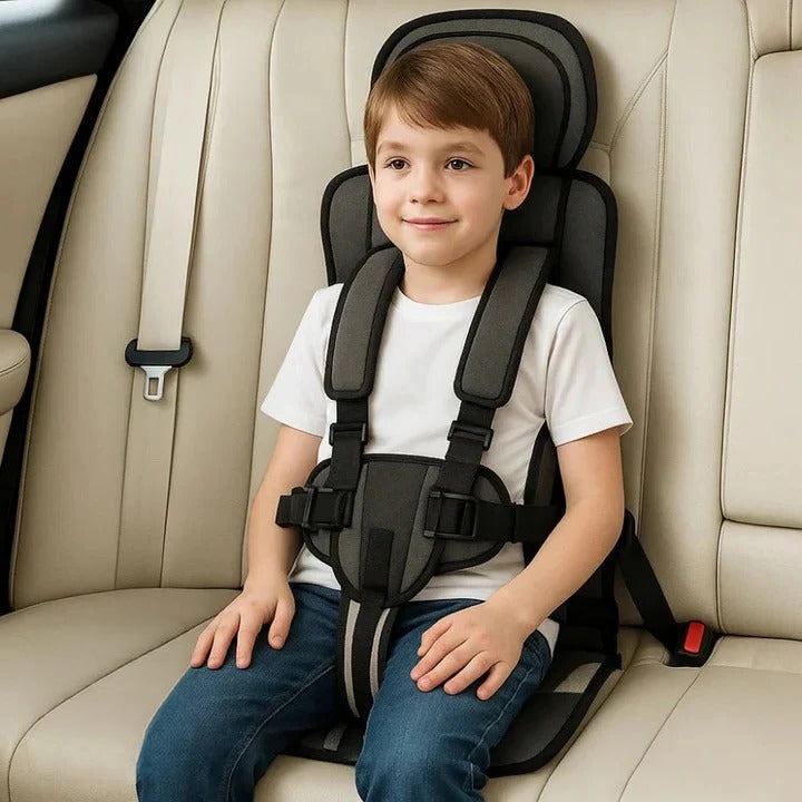 Essential kids travel gear: portable child car seat with a 5-point safety harness for safe journeys.