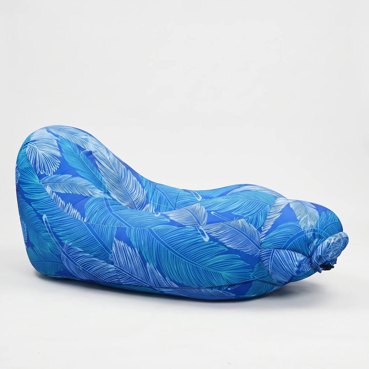 Comfortable inflatable outdoor sofa. Portable lounge chair ideal for travel, beach, park, or backyard leisure.