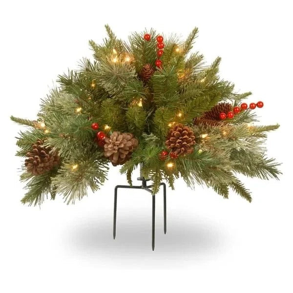 Lush pre-lit LED evergreen urn filler with pinecones and red berries, adding festive Christmas cheer.