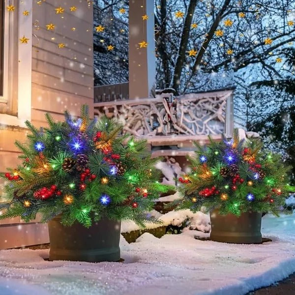Indoor pre-lit LED holiday urn filler, bringing warm festive glow and evergreen beauty to entryways.