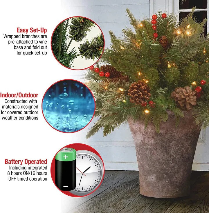 Festive evergreen pre-lit LED urn filler adorned with faux snow, pinecones, and red berries for charming seasonal decor.