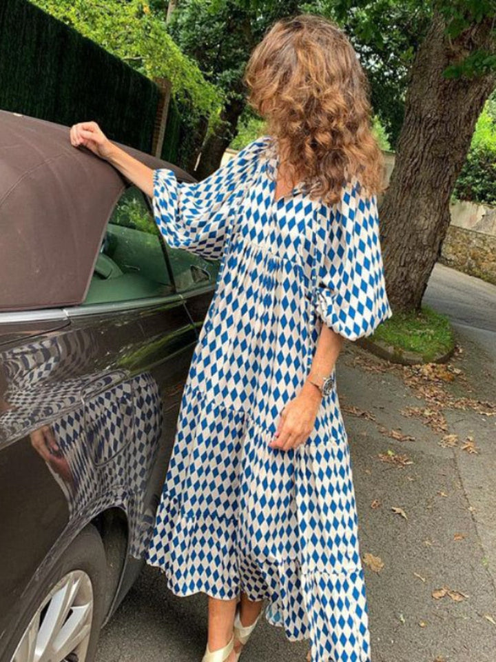 Printed beach maxi dress for women, with short sleeves, flattering fit, and bohemian style.