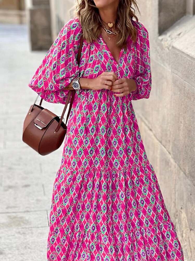 Women's elegant printed maxi dress, featuring a comfortable waistband and a flowy fit.