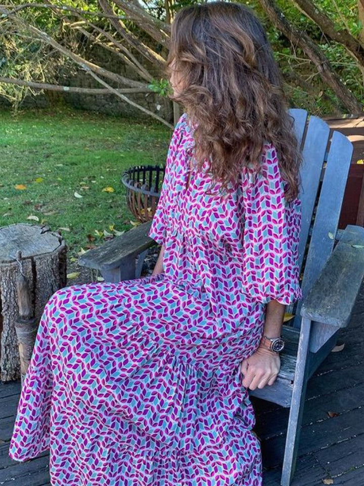 Women's short sleeve maxi dress, printed pattern, and a flattering waist for summer.