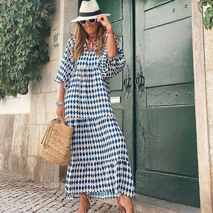 Aurelia elegant printed maxi dress, short sleeve, ankle length, perfect for warm weather.