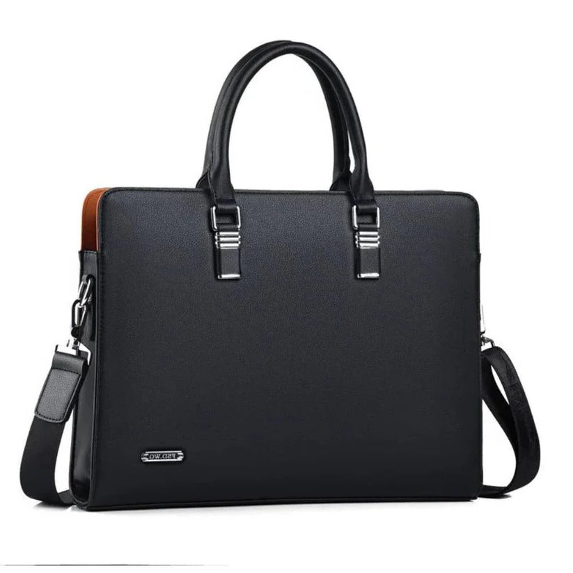 Sleek men's business travel bag. Dedicated compartments for 14-15 inch laptops & professional gear.