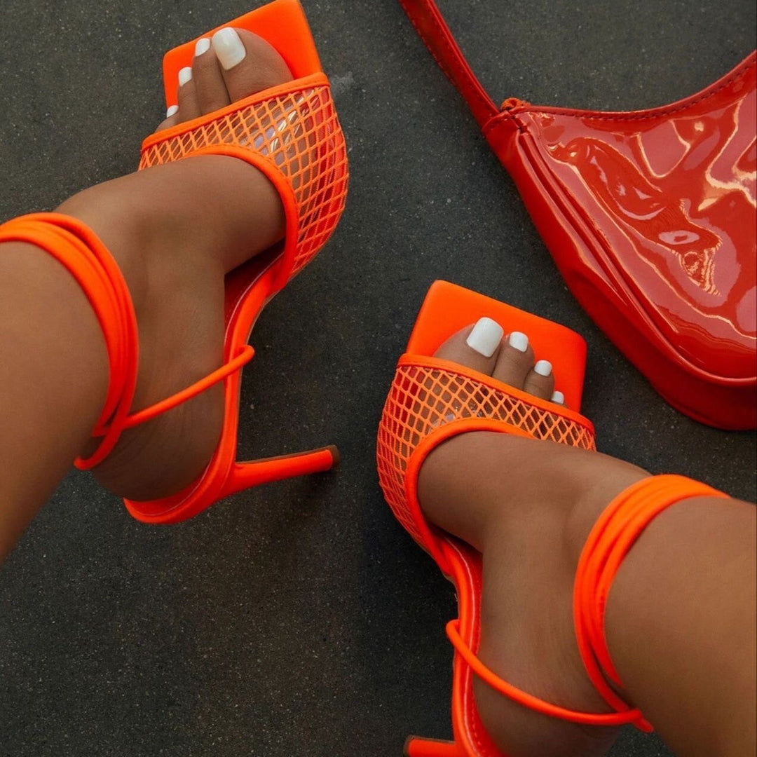 Everyday elegant women's pumps featuring a pointed toe, beautiful lace-look, and a stable block heel.