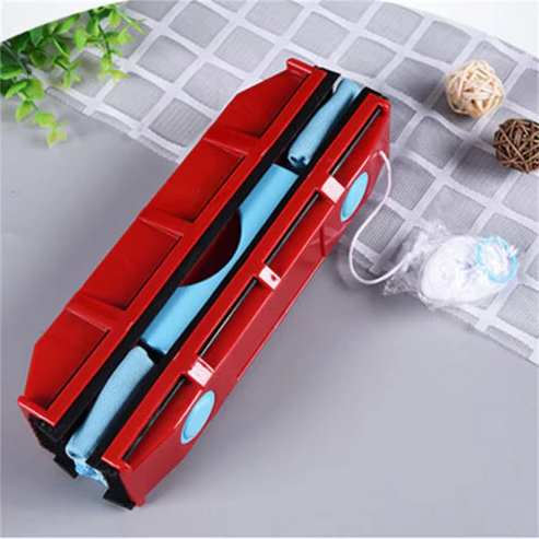 Red double-sided magnetic window cleaner with ergonomic grip and adjustable strength for various window thicknesses.