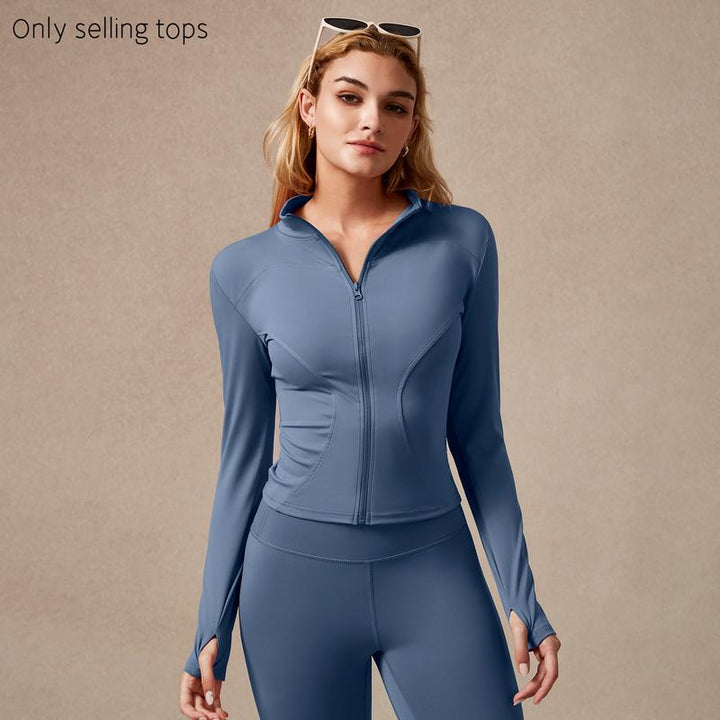 Black women's full-zip activewear top with sculpted fit, perfect for workouts, made from performance stretch material.