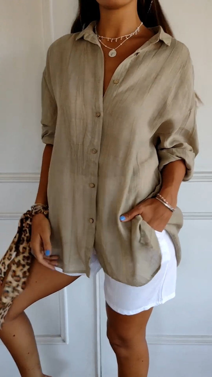 Women's oversized button-down blouse, perfect for summer casual chic style.