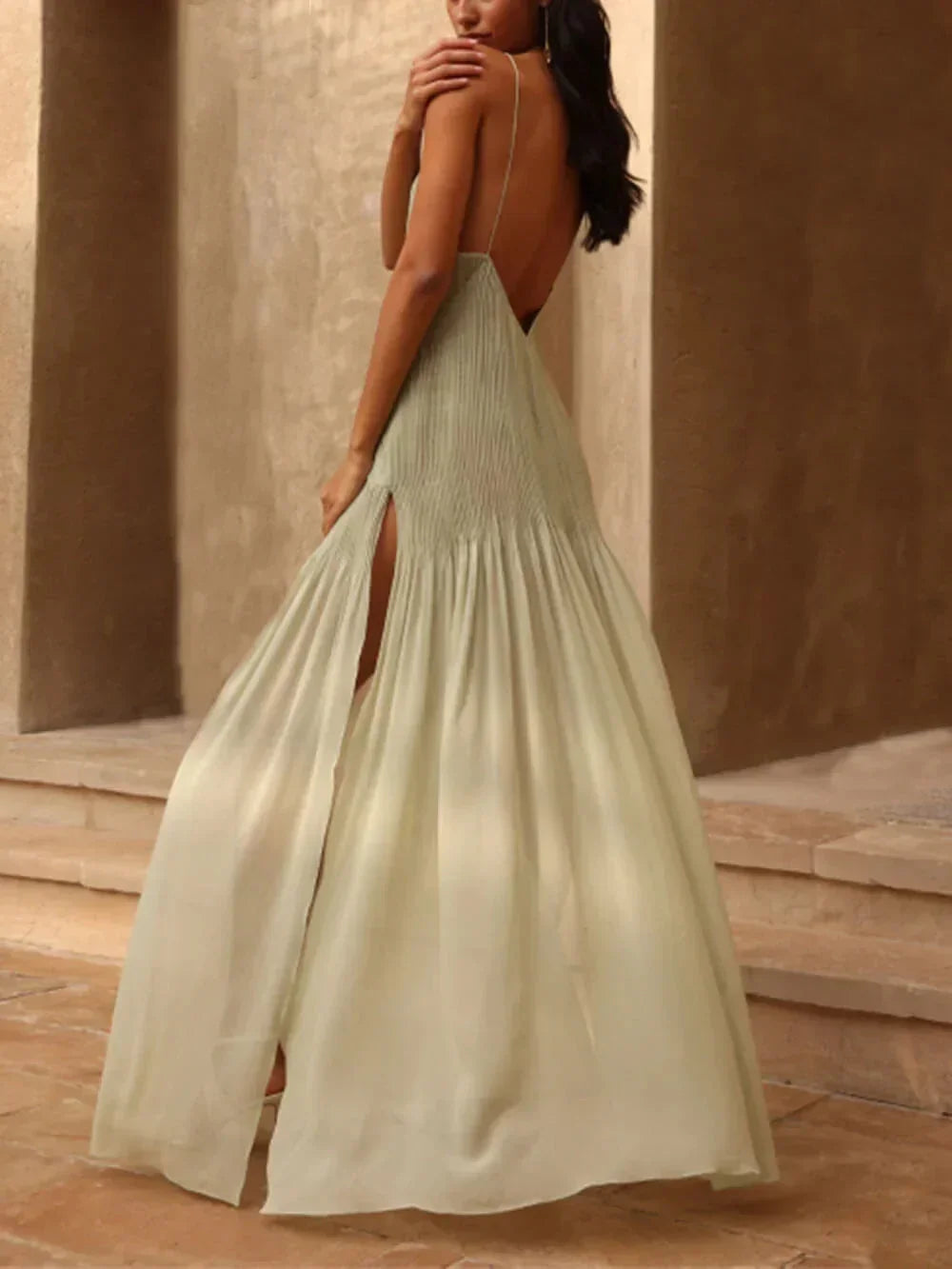 Stylish long green pleated maxi dress for women, ideal for evening wear, special occasions, or wedding guests.