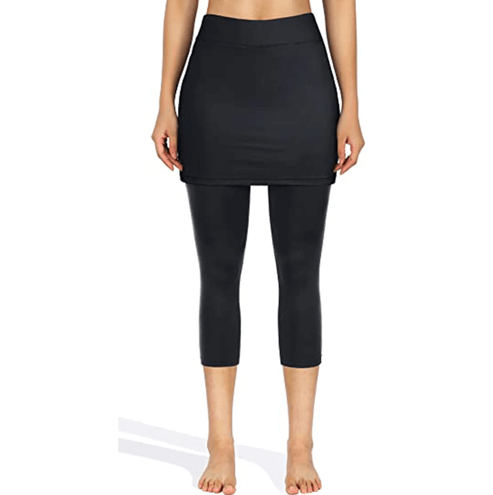 Modest yet fashionable women's skirted leggings, perfect for activewear with pockets.
