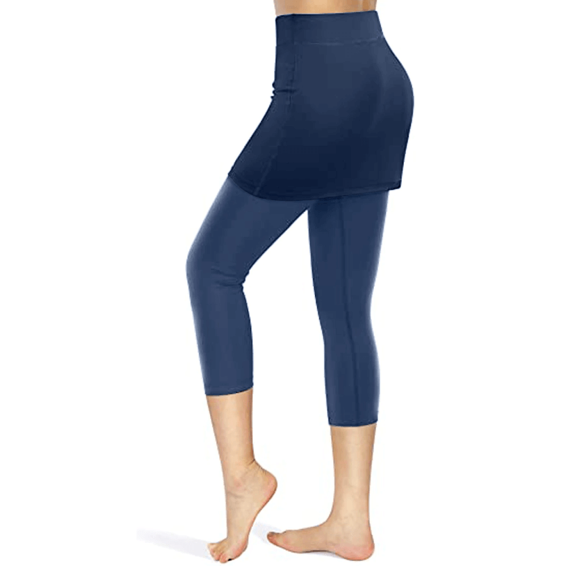 Modest workout pants: women's skirted leggings with convenient side pockets.