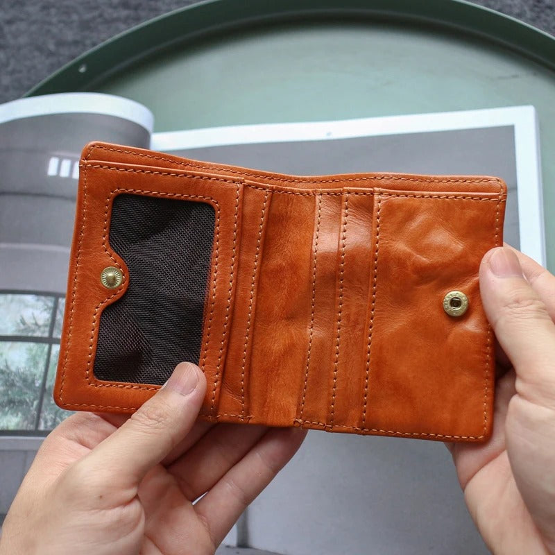 Detailed view of the stitching on a rugged full grain cowhide leather men's tri-fold wallet