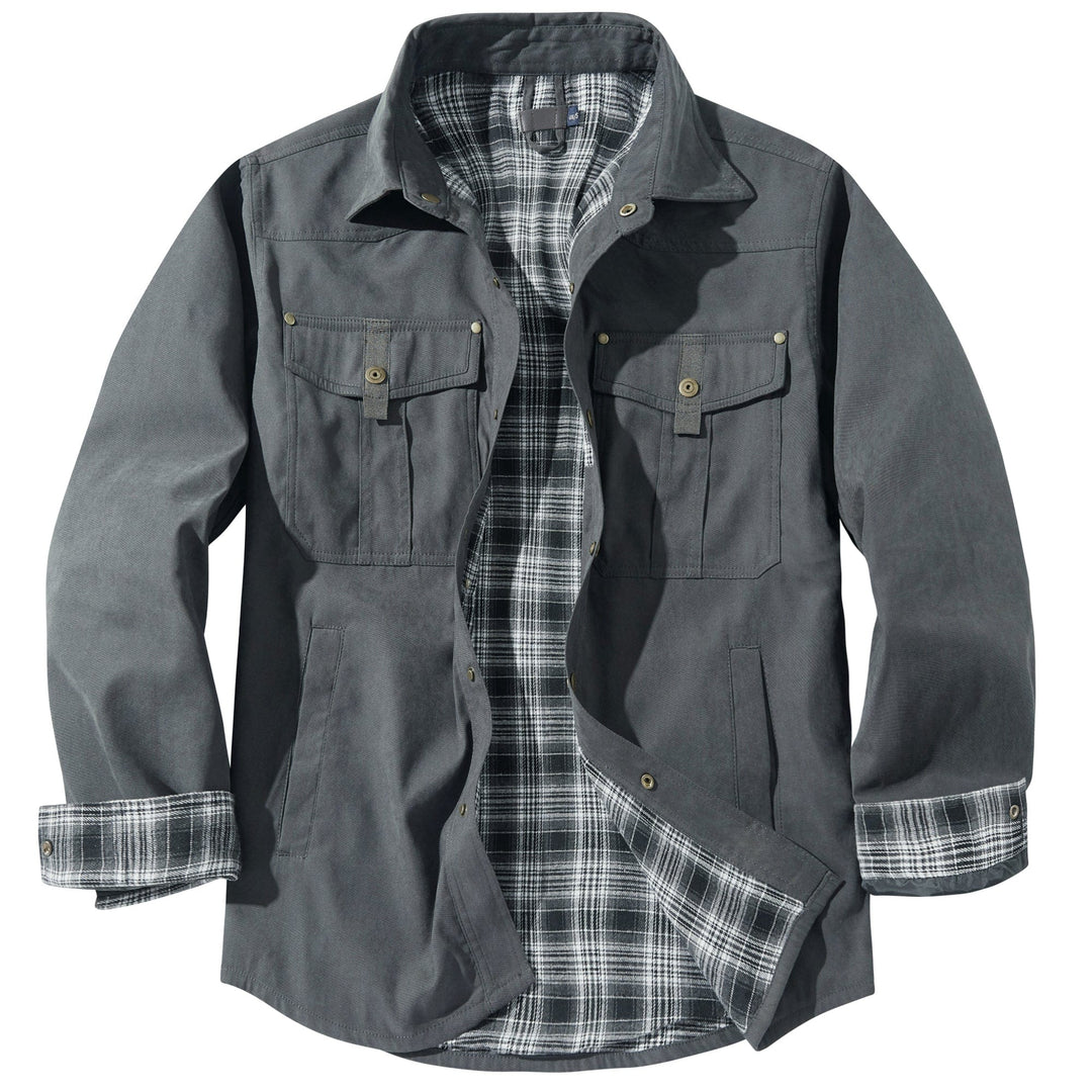 A man wearing the rugged multi-season outdoor jacket, showcasing its fit and style