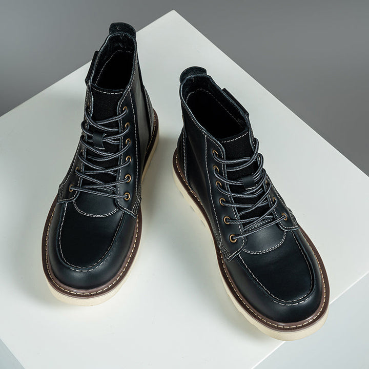 Display of various sizes of rugged brown men's waterproof chukka boots, ideal for casual wear