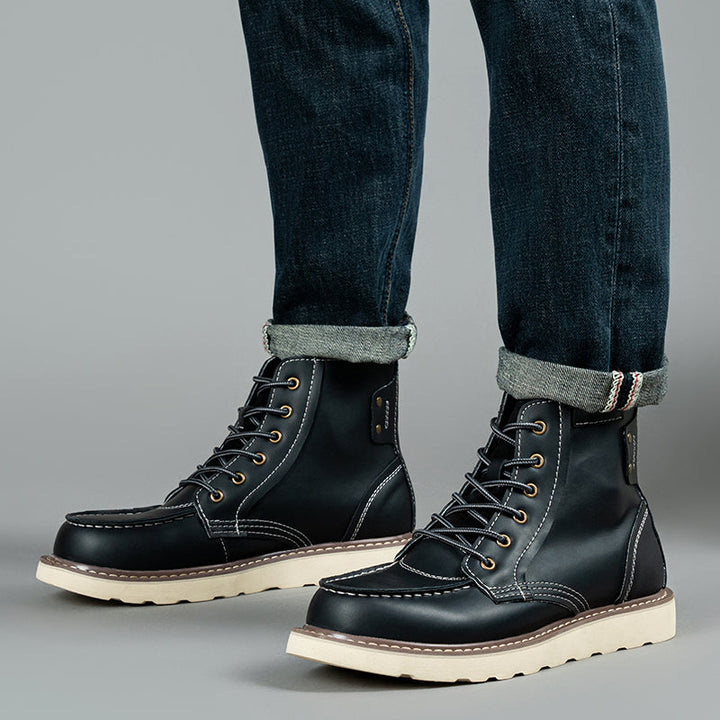 Focus on the waterproof label on a black men's chukka boot, assuring its protective qualities