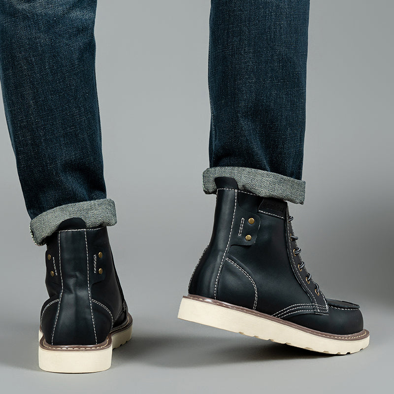 Pair of rugged brown waterproof chukka boots, presented as essential men's casual footwear