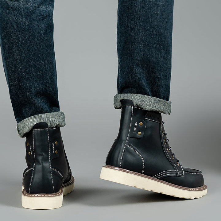 Pair of rugged brown waterproof chukka boots, presented as essential men's casual footwear
