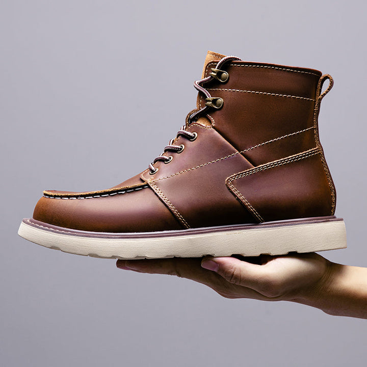 Black waterproof chukka boots for men, in a studio shot, emphasizing their clean and durable lines