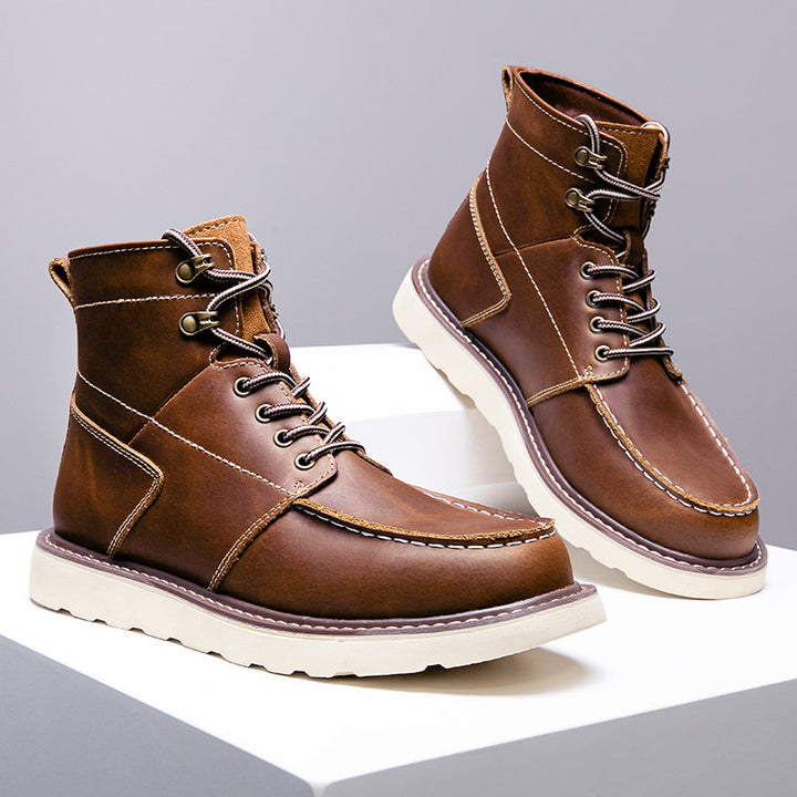 Brown waterproof chukka boots for men, resting on a wooden surface, highlighting natural durability