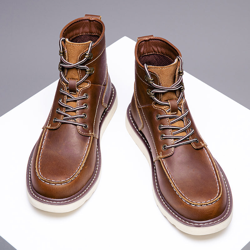Angle shot of brown rugged men's waterproof chukka boots, with focus on the ankle support