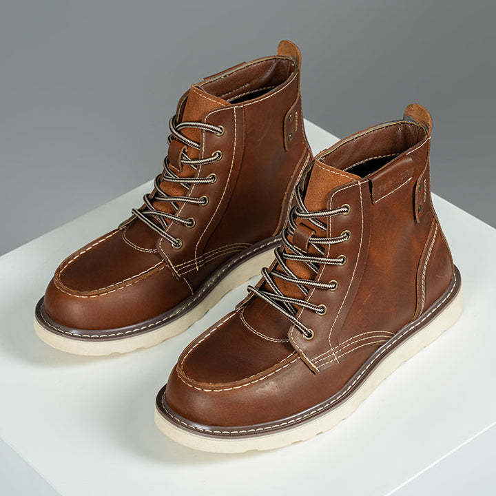 Side view of a men's waterproof chukka boot in black with durable sole for casual footwear
