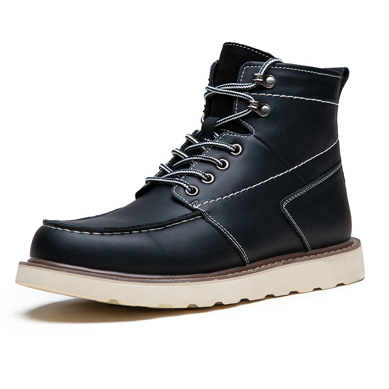 Waterproof men's chukka boots in black, pictured with other casual accessories like a watch
