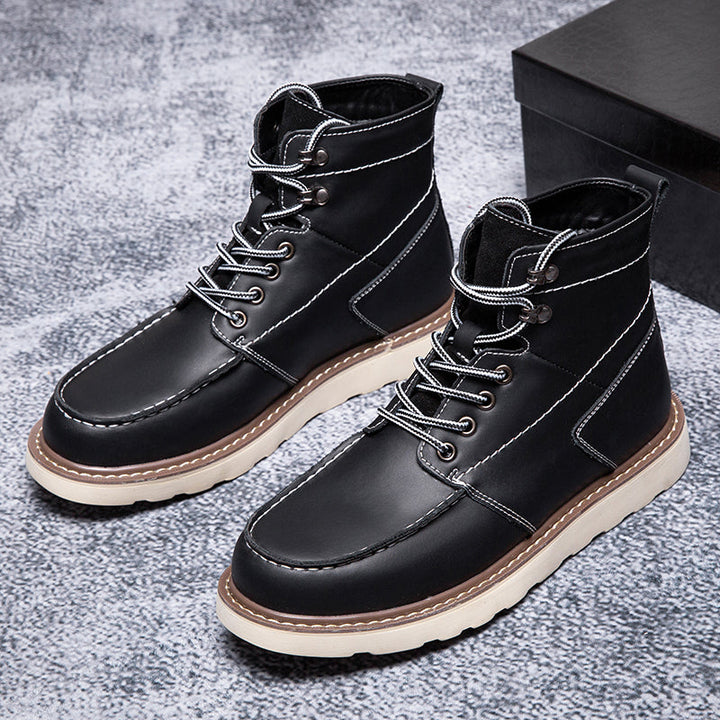 Black men's waterproof chukka boots, captured in motion to show their flexible, durable design