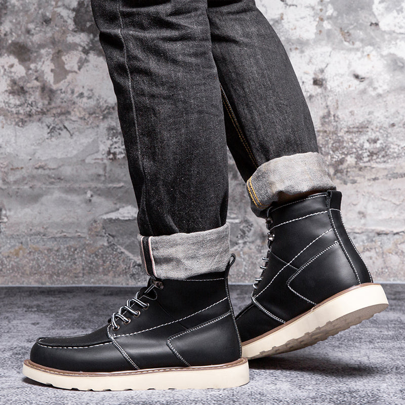 Waterproof black chukka boots for men, isolated to highlight their robust and functional features