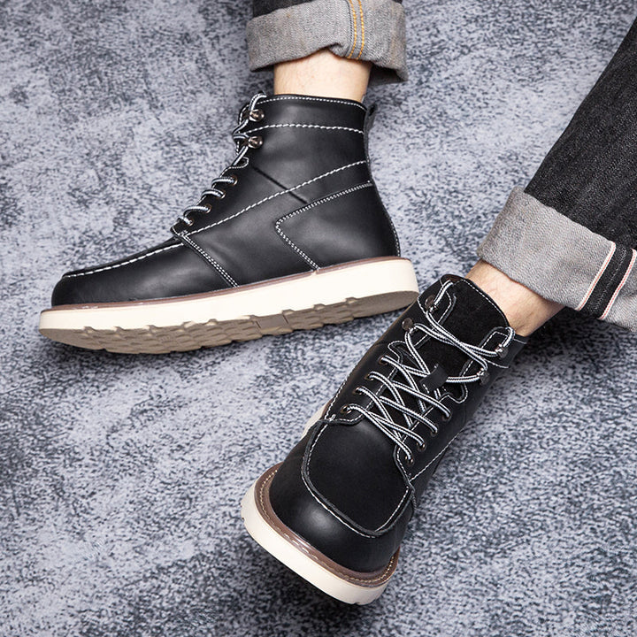 Men's brown waterproof chukka boots, pictured in a dimly lit, cozy indoor setting for casual comfort