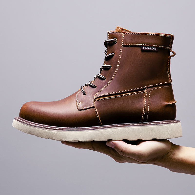 Brown men's waterproof chukka boots with a focus on their comfortable, cushioned ankle collar