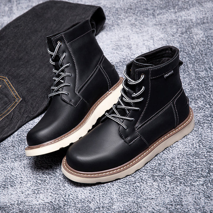 Black waterproof chukka boots for men, embodying robust construction and a sleek, durable finish