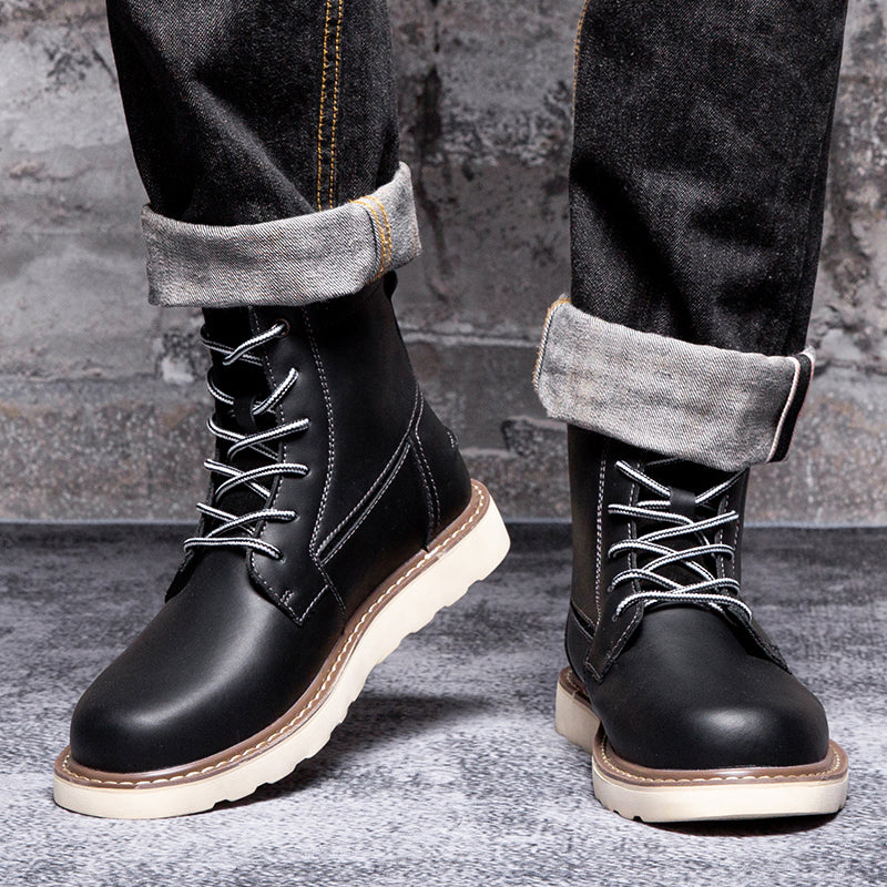 Black men's waterproof chukka boots, captured in a dynamic pose to reflect their active and durable nature