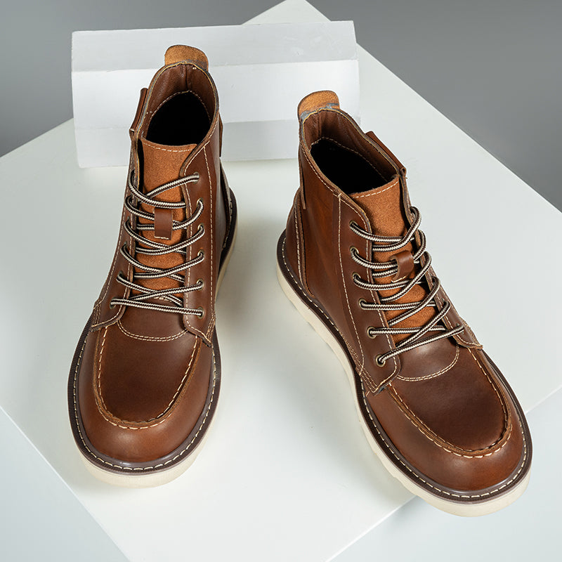 Outdoor shot of black waterproof men's chukka boots on a natural, rugged terrain
