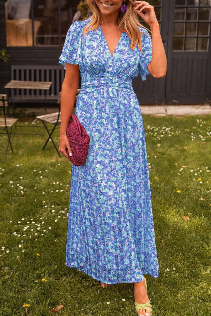 Vibrant floral women's maxi dress, stunning for a wedding guest, party, or summer event.